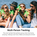 Four women sitting together outdoors by the water, each holding a glowing green neon peace sign. Text at the bottom reads 'Multi-Person Tracking' with additional promotional copy about group shots.