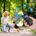 Person holding a Avinora Dog Training Shock Collar device with a dog and woman in a park setting