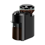 Black BrewixMi Coffee Grinder with a clear container of coffee beans on a white background