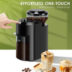 Black BrewixMi Coffee Grinder with coffee beans and iced coffee on a green background