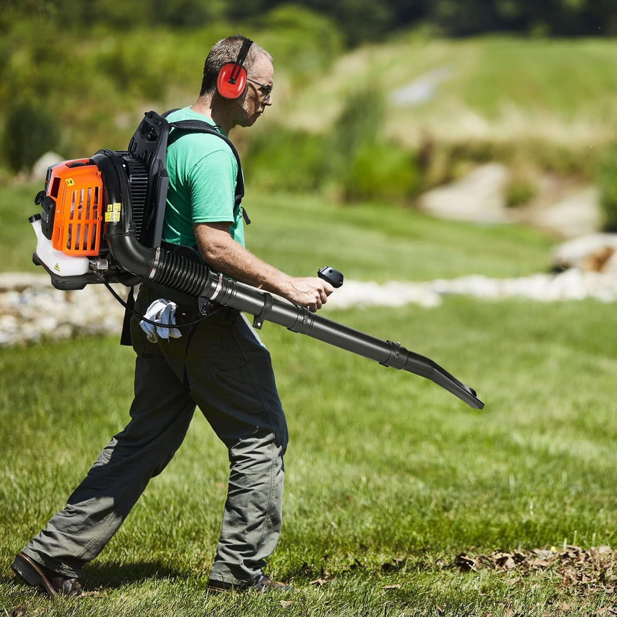 Man using a CleNolif 52CC Backpack Leaf Blower in a grassy outdoor setting
