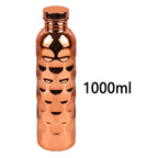 A 1000ml copper-colored CopperSyp Copper Water Bottle with a textured honeycomb pattern and a matching metallic cap, shown on a plain white background with '1000ml' text overlay.