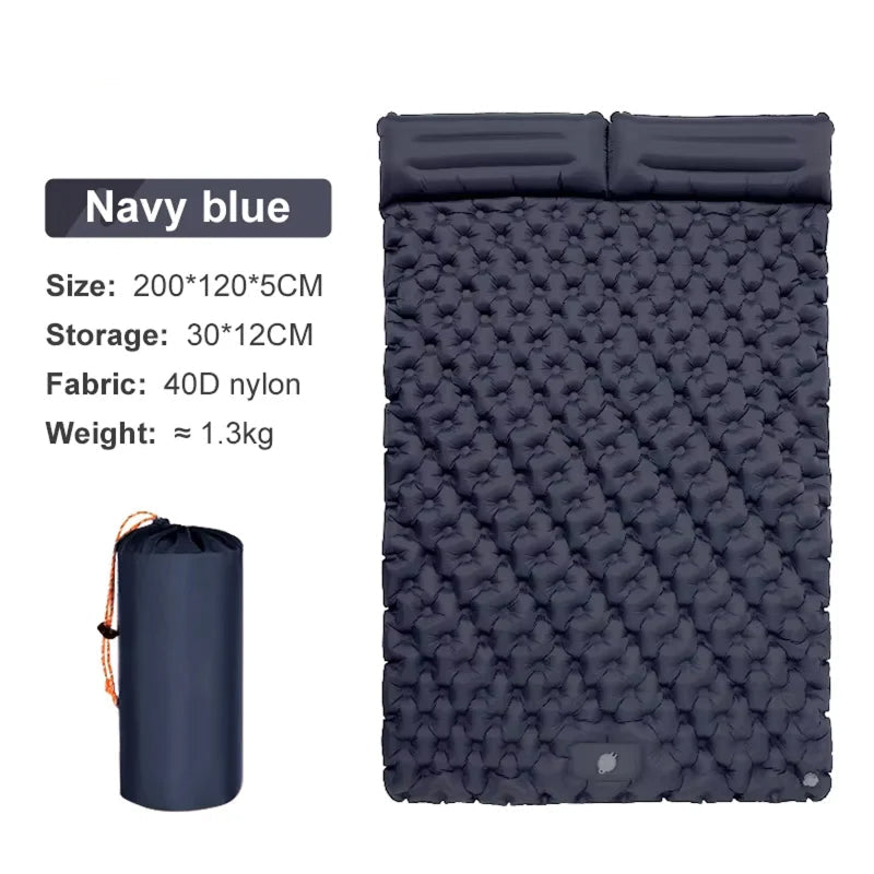 Navy blue DuoRestor Pro Camping Mattress with packaging on a white background