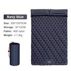 Navy blue DuoRestor Pro Camping Mattress with packaging on a white background