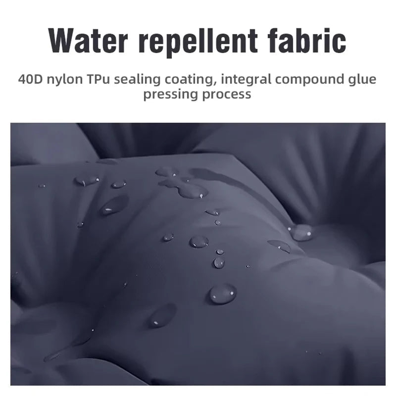 Water repellent fabric with water droplets on a dark gray background