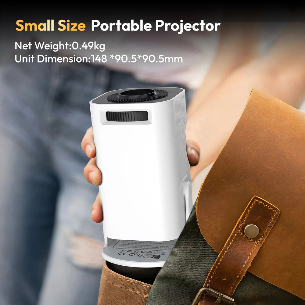 A small portable DuskiCast Smart Projector being held by a person, shown in a lifestyle context with a leather apron in the foreground. Text at the top reads 'Small Size Portable Projector' with weight and dimension details.
