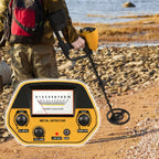 Person using a Evove Metal Detector on a rocky beach