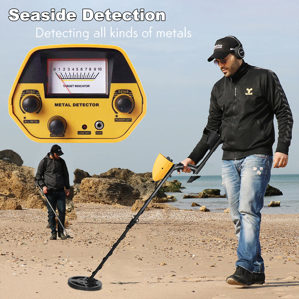 Man using a Evove Metal Detector on a beach with 'Seaside Detection' text.