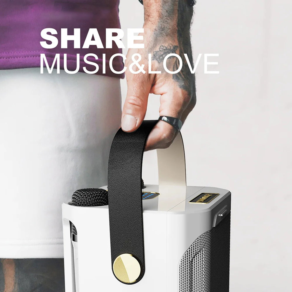 Person holding a black strap over a white portable FolbGent Karaoke Machine with 'SHARE MUSIC&LOVE' text.