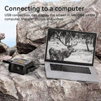 Laptop displaying a deer image on a rocky surface with HeatSkye Night Vision Goggles device.