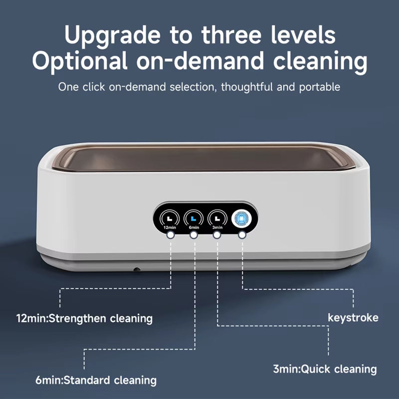 Portable JewelyClin Ultrasonic Jewellery Cleaner with control panel on a dark blue background
