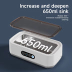 White JewelyClin Ultrasonic Jewellery Cleaner with a 650ml capacity on a dark blue background