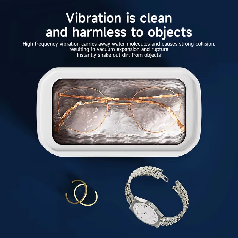 JewelyClin Ultrasonic Jewellery Cleaner with glasses and watch on a blue background