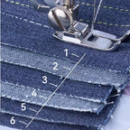 Kalvori Sewing Machine sewing through denim layers