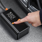 Digital Mektri 2 in 1 Jump Starter & Tyre Inflator with a hand pressing a button inside a car.