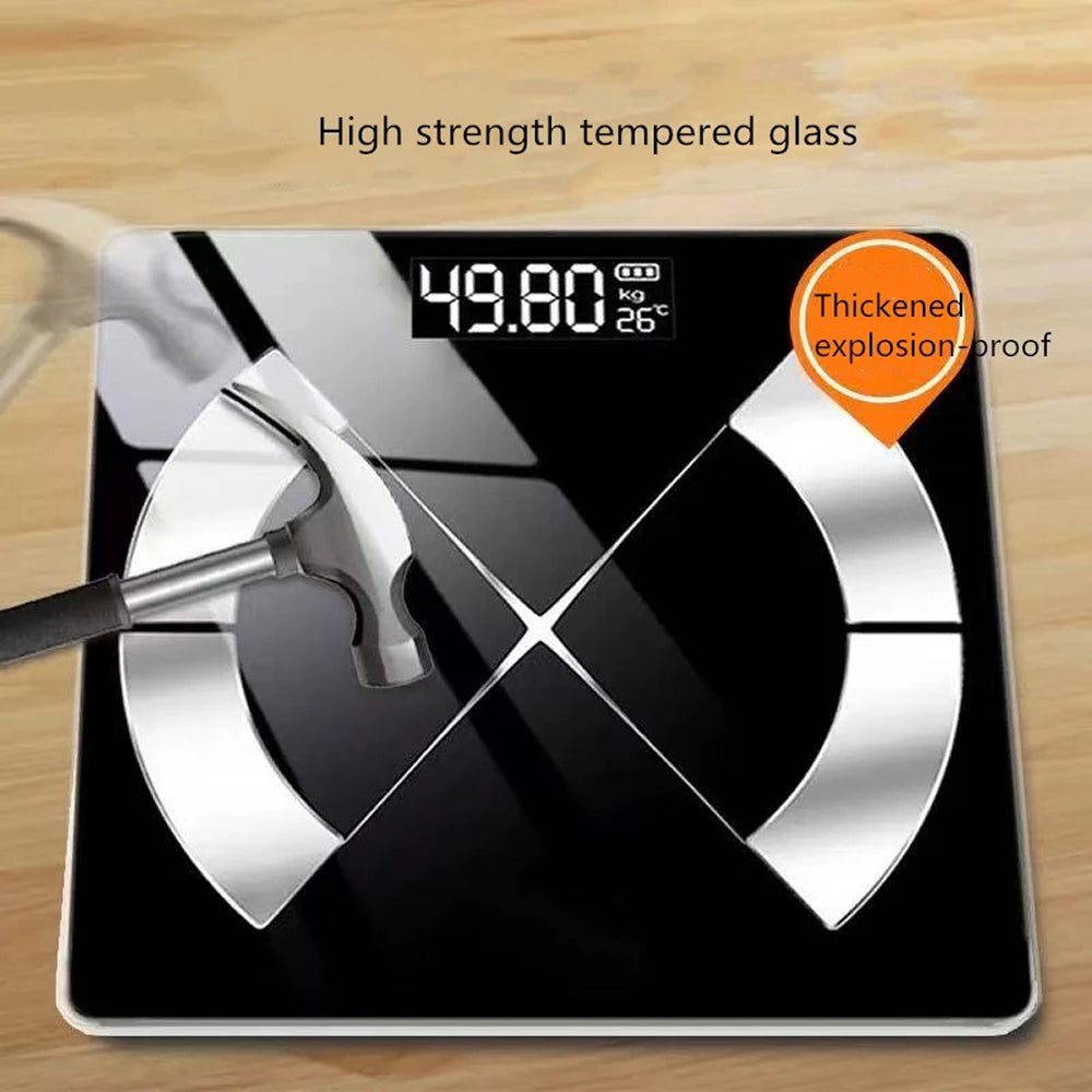 Digital bathroom MillKindy Smart Body Scale with tempered glass surface on a wooden background