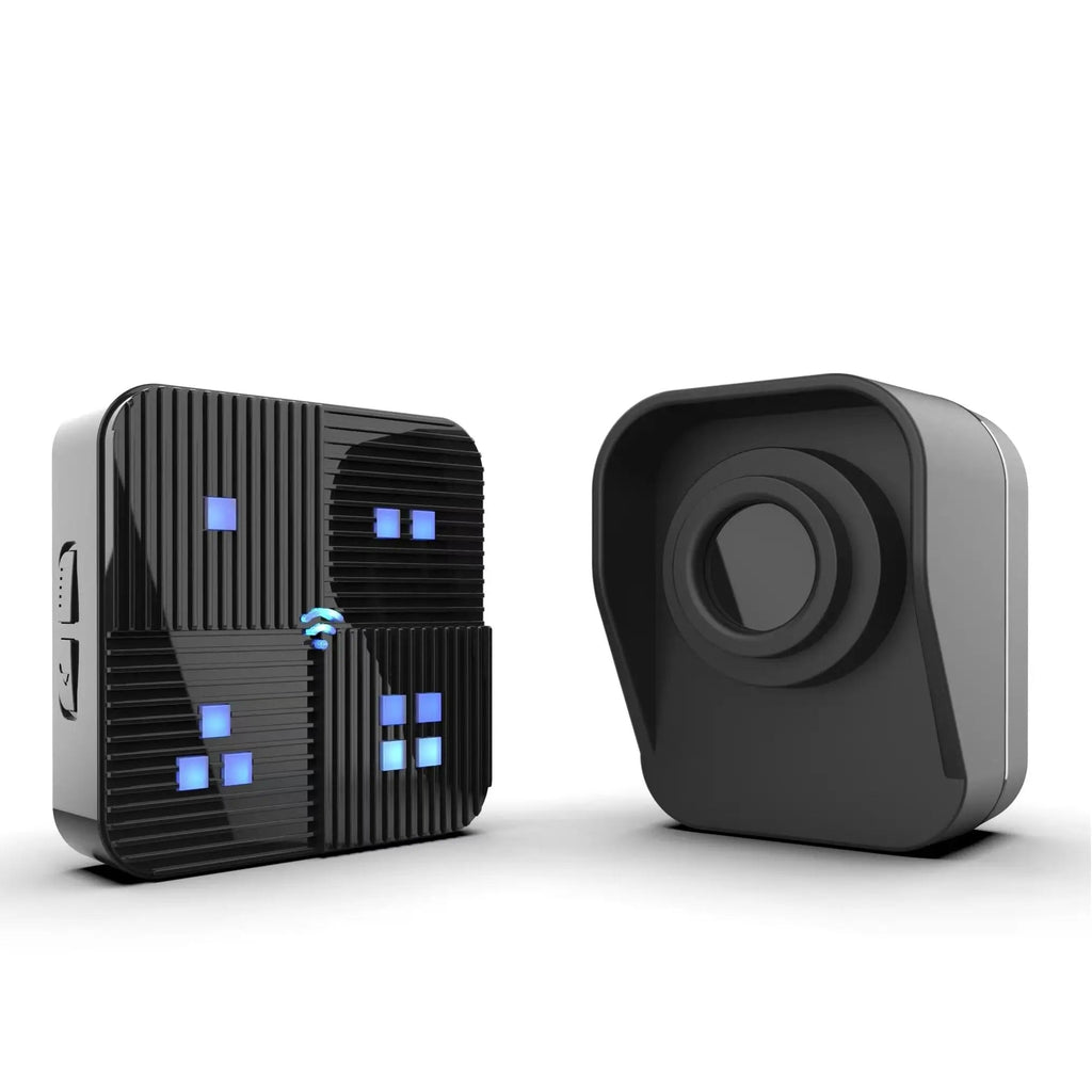 Two small SeniWav Driveway Sensor devices on a clean white background: one black device with blue illuminated window-like indicators and a small blue signal icon, and one dark gray square device with a circular lens or sensor on the front.