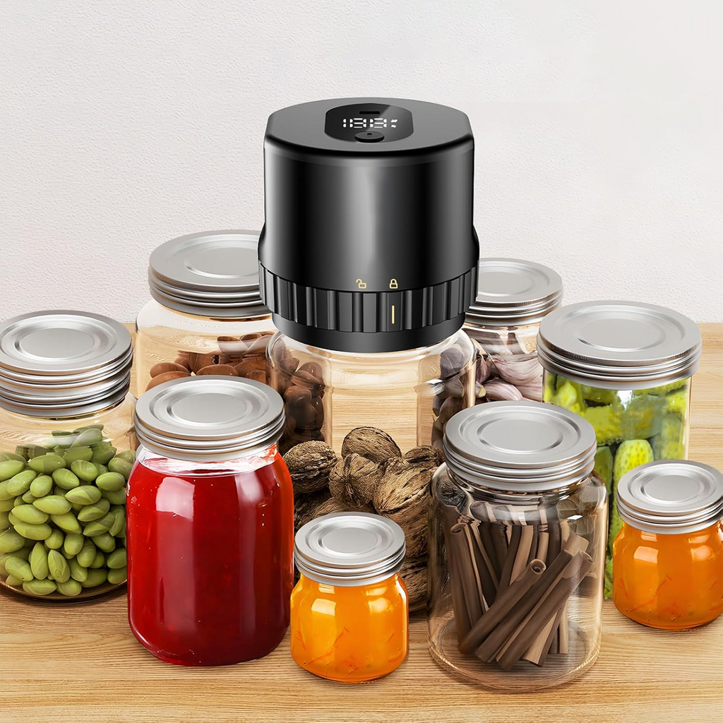 Black kitchen timer on jars of food with a white background