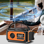 Portable radio with AM, FM, and WB frequencies displayed, placed on a surface.