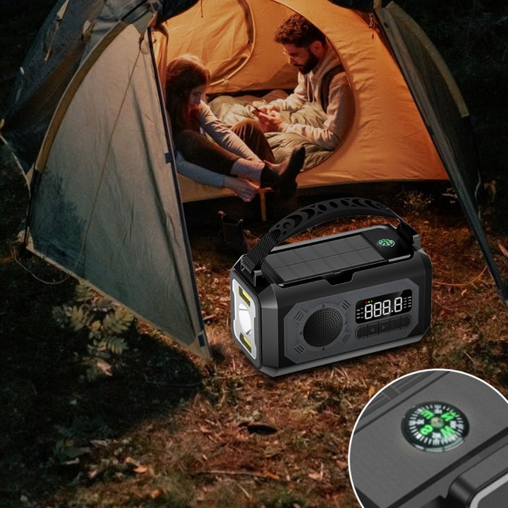 Camping scene with a family inside a tent and a portable Tiverno Emergency Radio on the ground.