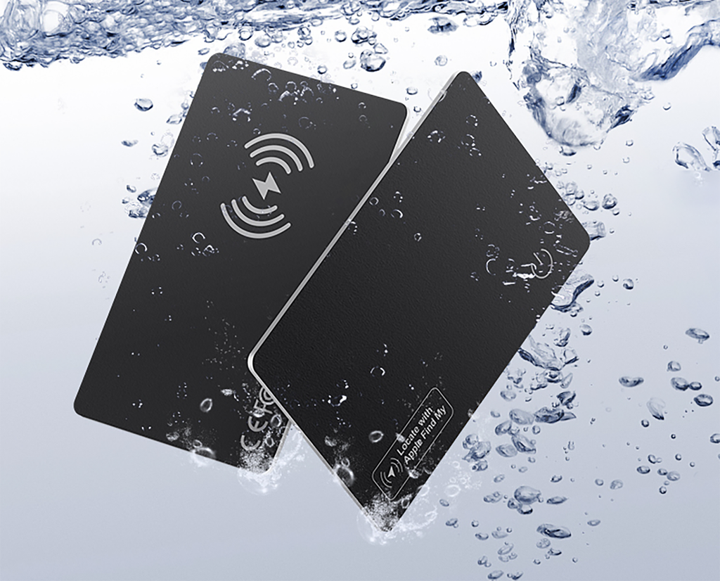 Two black Tiverno Wallet Tracker Card with wireless charging symbols on a water background