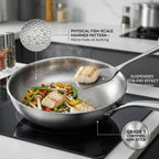 Tossenium Titanium Frying Pan with food on a stove, highlighting features like fish-scale hammer pattern and non-stick coating.
