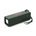 Green portable speaker with red buttons on a white background