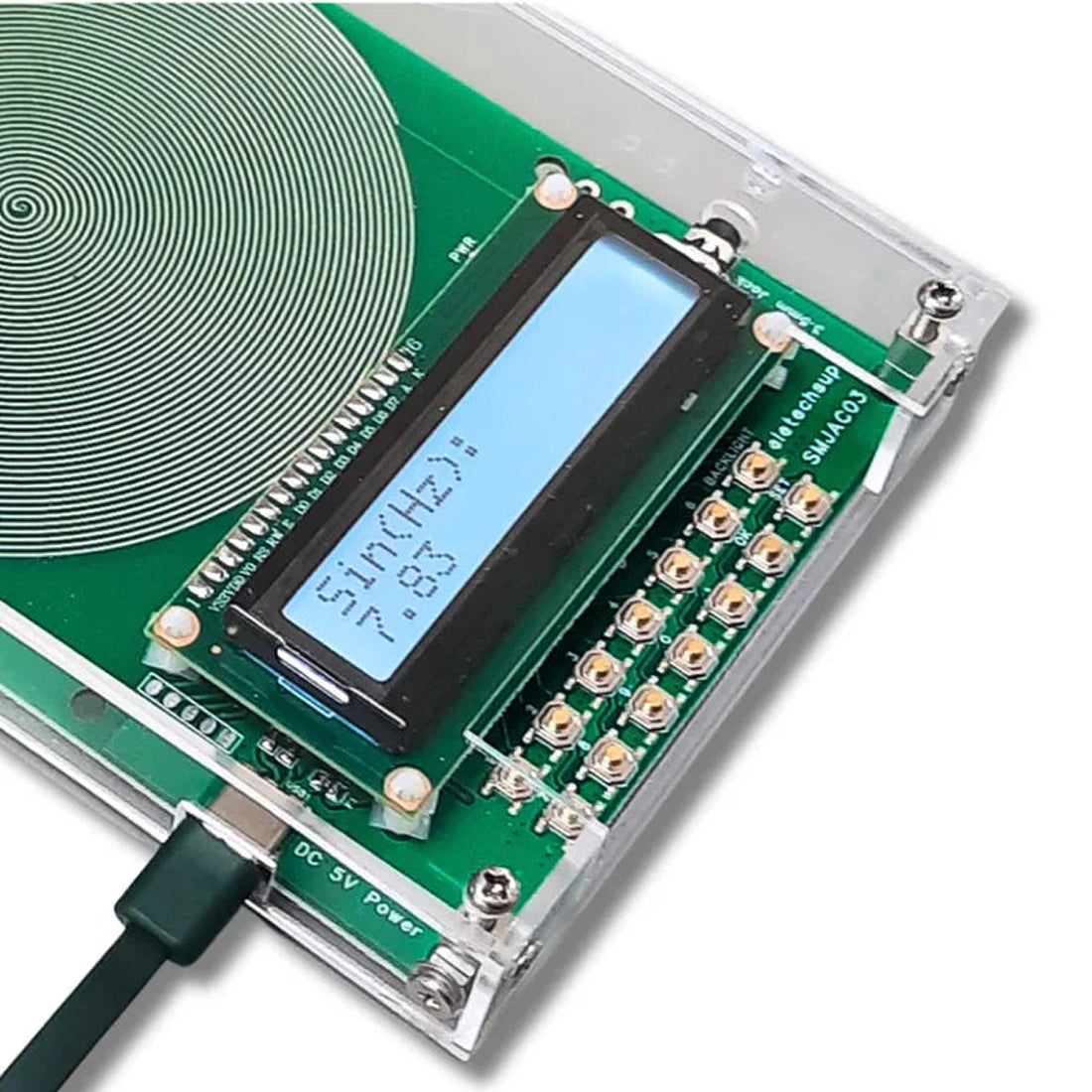 VanotCine Frequency Generator with digital display and printed circuit board on a white background