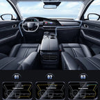 Car interior with dashboard and steering wheel, featuring a digital display and control panel.