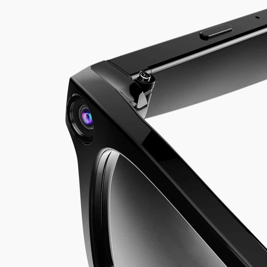 Close-up of a black Visioxe AI Smart Glasses with camera and front-facing camera on a white background