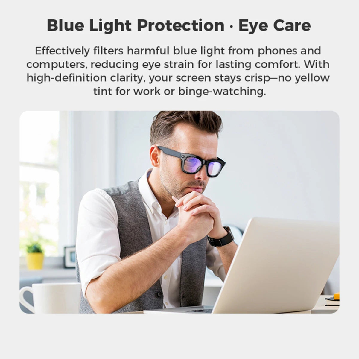 Person wearing Visioxe AI Smart Glasses filtering glasses while using a laptop with text about blue light protection and eye care.