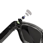 Visioxe AI Smart Glasses with a clear lens and black frame, showing internal components on a white background.