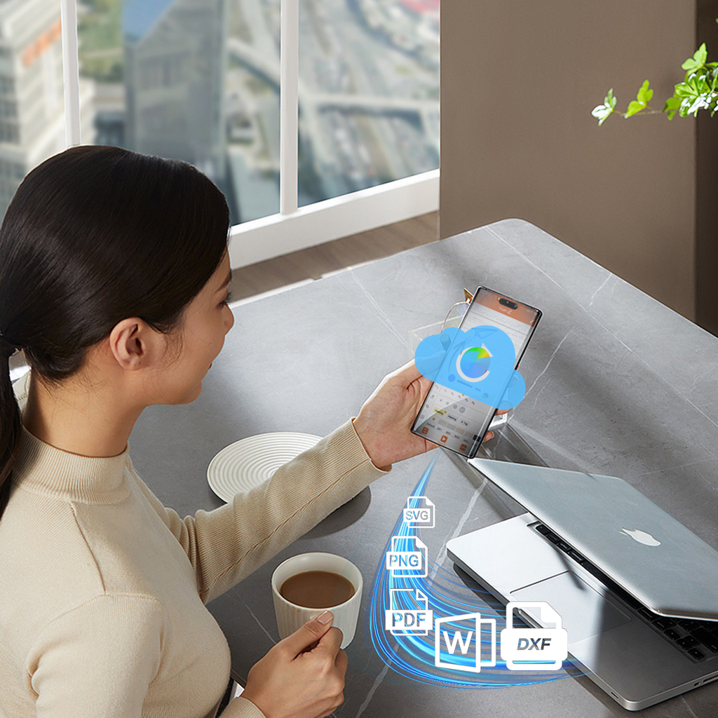 Woman using a smartphone with cloud icon at a desk with laptop and coffee cup.