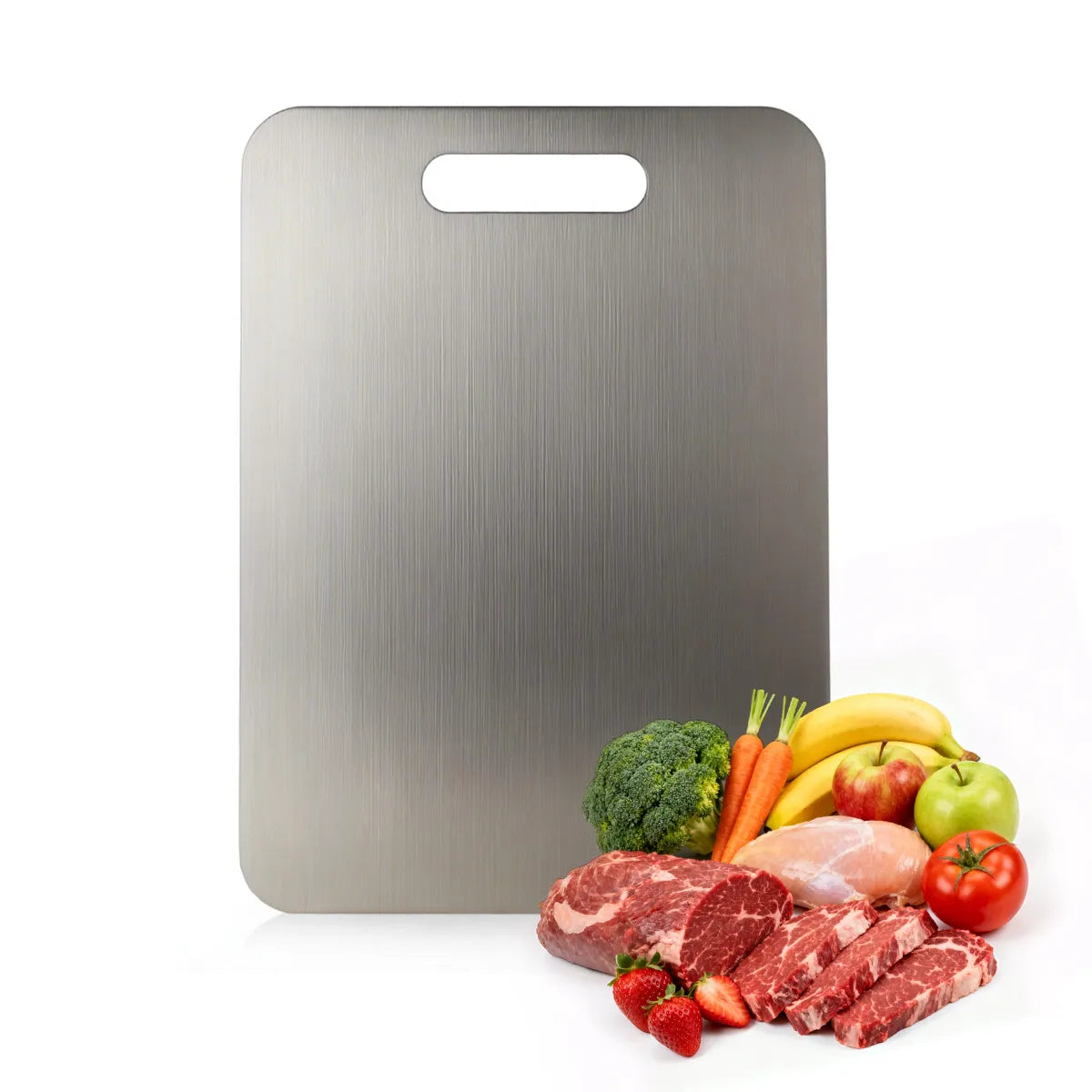 Wavel Titanium Cutting Board with fresh produce and meats on a white background