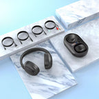 Black wireless Tiverno TV Headphones and charging case on a marble surface with a blue background