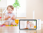 Baby sitting on the floor with a Wavel Baby Monitor displaying a video of itself, in a room with a plant and shelves.